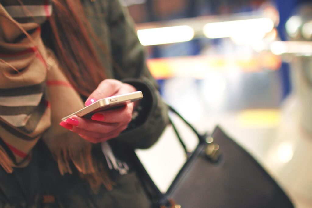 Woman Holding Smartphone