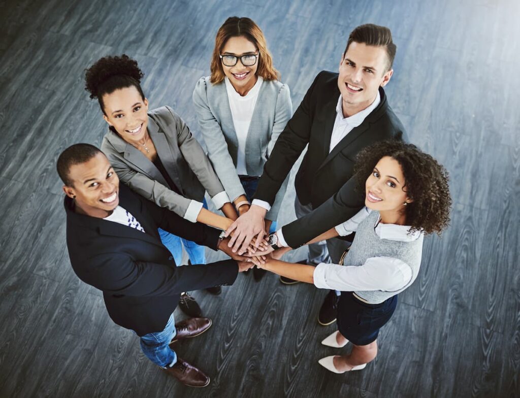 strategic partners holding hands